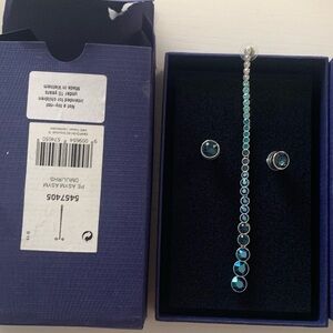 Swarovski Blue Solitaire and Dangle Earrings never used